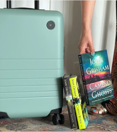 John Grisham Summer Sweepstakes - Win 3 Novels Signed By Author John Grisham And A Carry-On Suitcase